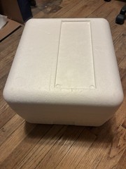 Styrofoam box. 13” x 10” x 11” outside dimensions.